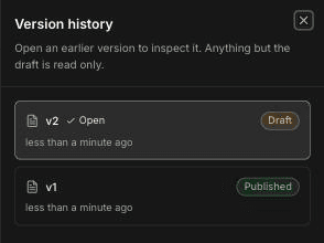 Version history panel listing v2 as the open Draft and v1 as Published