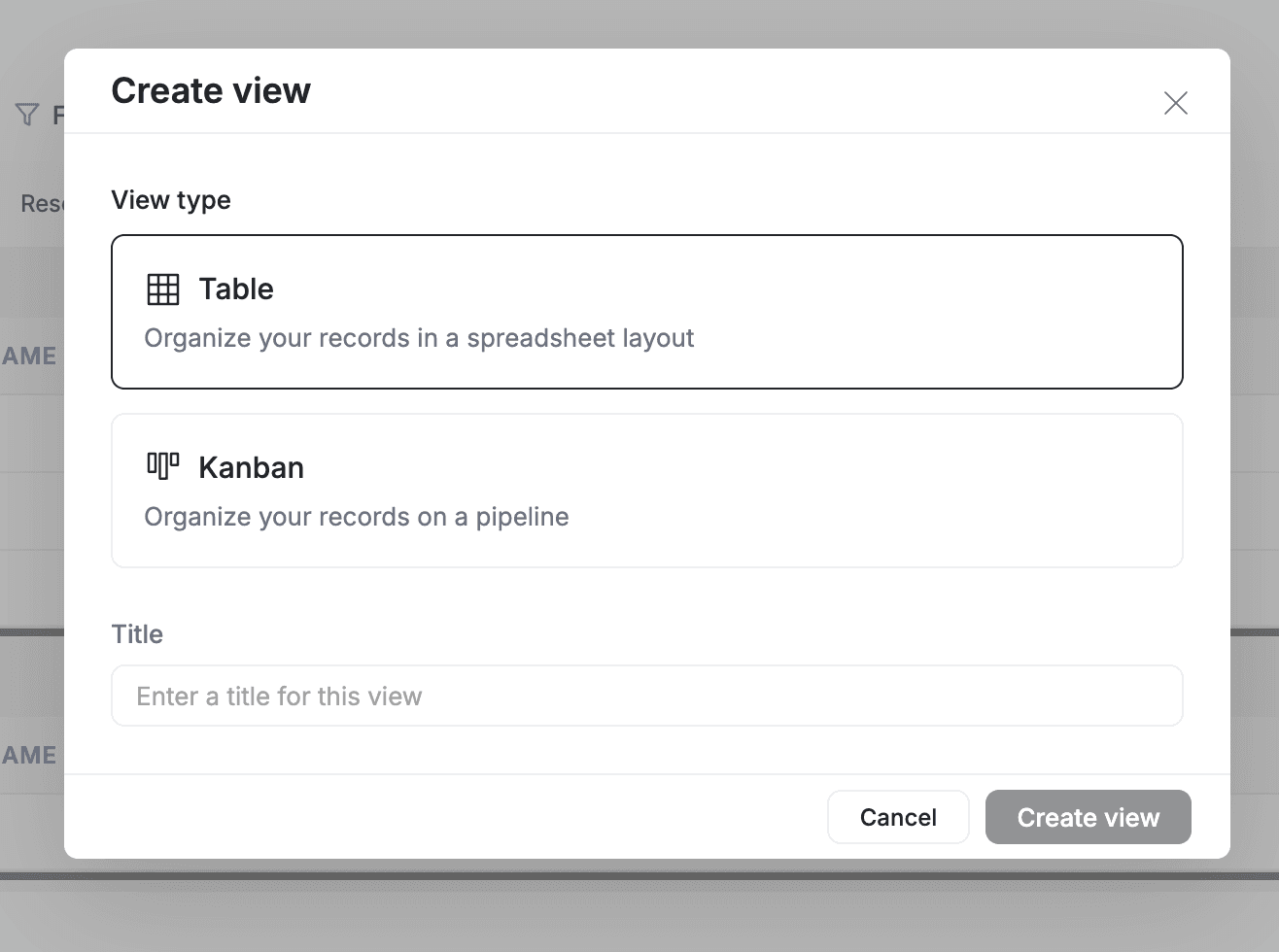 FieldCamp Create view modal with title field, Table and Kanban view type options, and kanban property selector